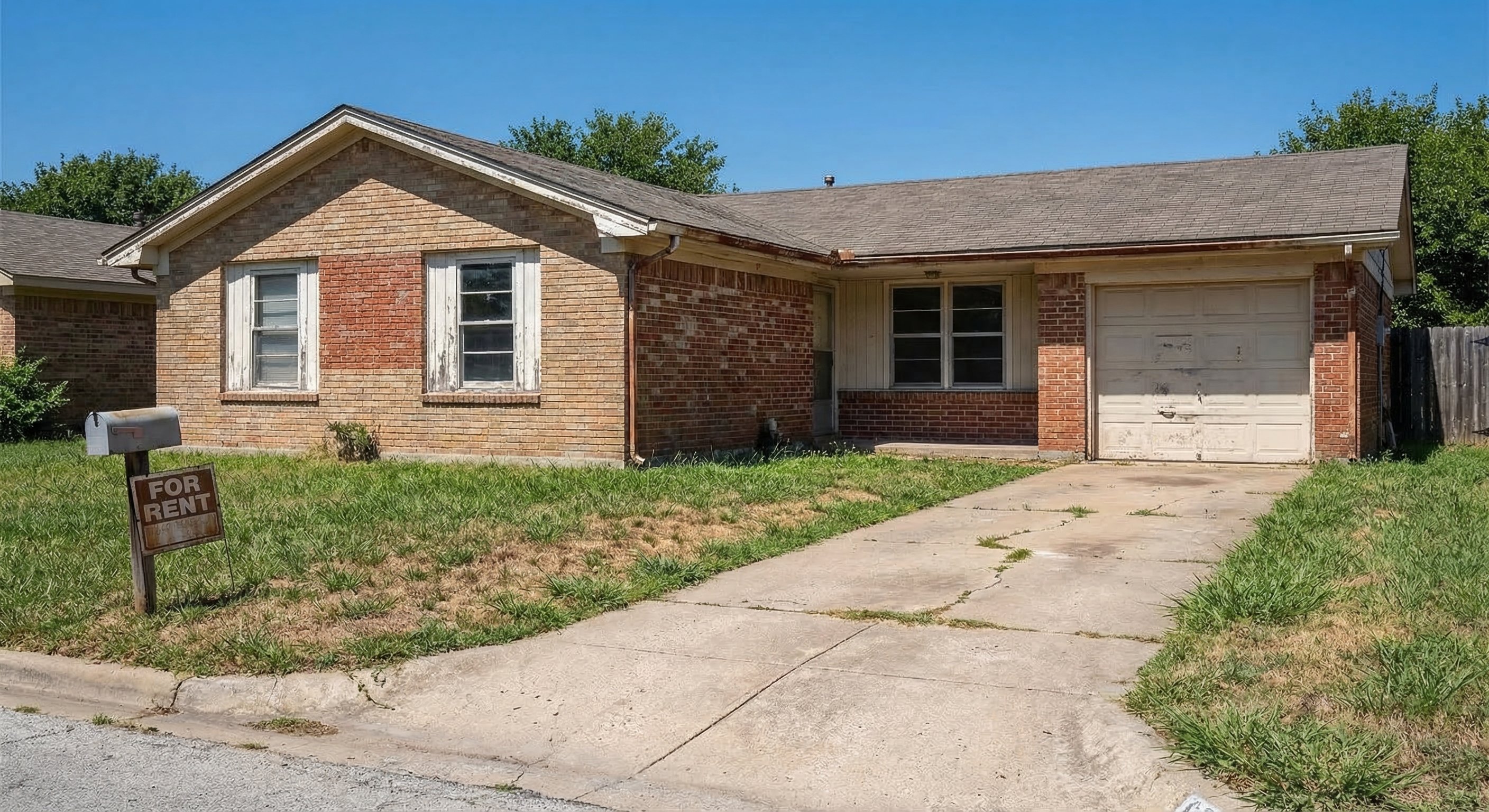 Single-story Texas brick ranch home with overgrown lawn, faded shutters, and for-rent sign — classic absentee-owned property in suburban Dallas