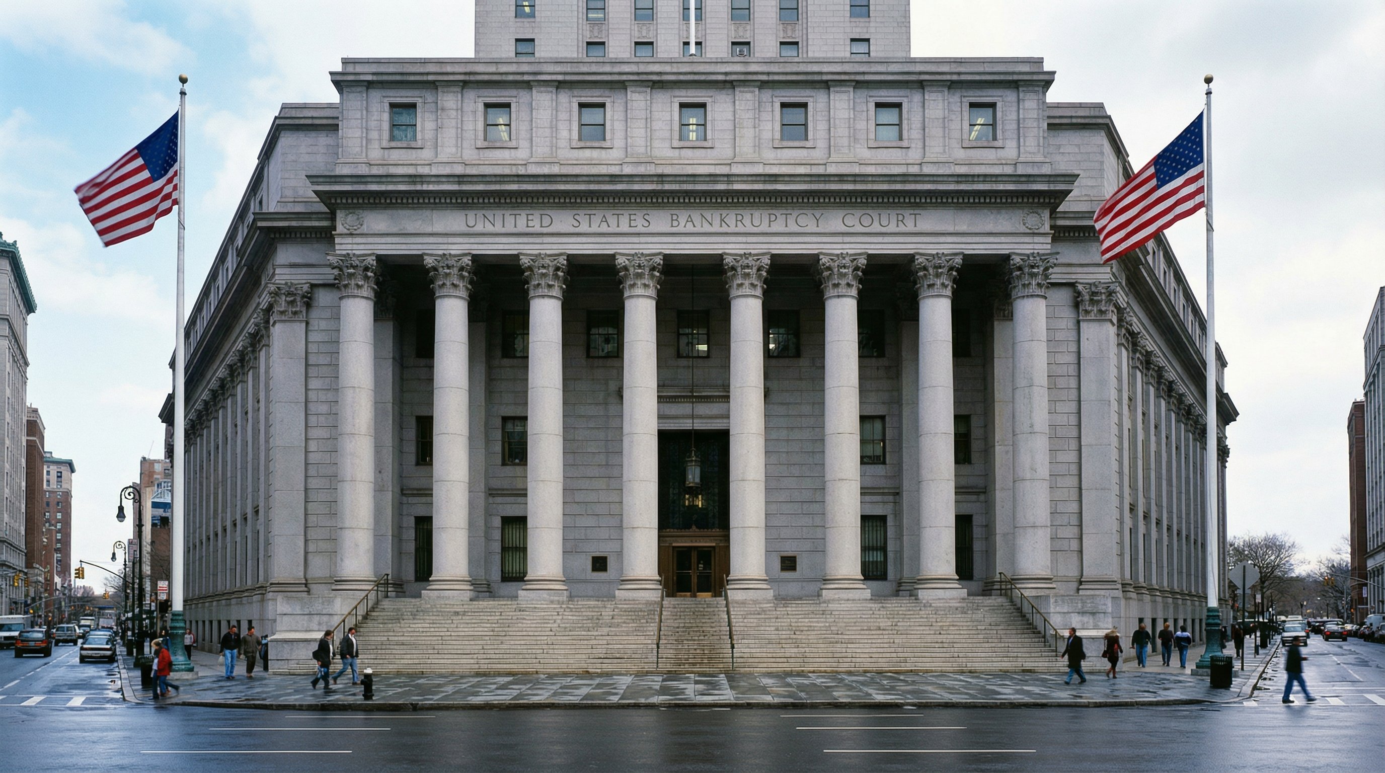 US Bankruptcy Courthouse exterior with Greek columns and stone steps under clear sky