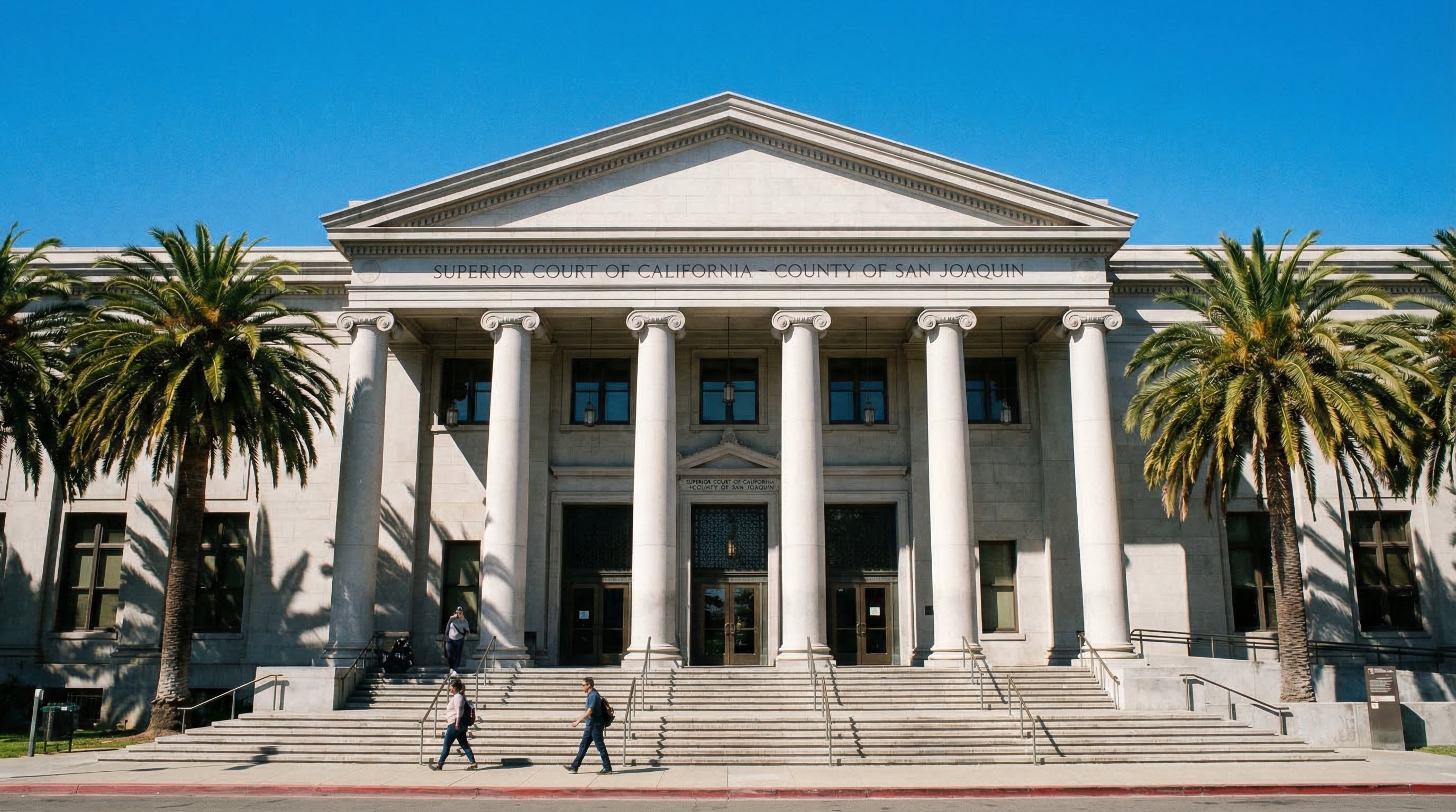 California Superior Court building exterior with palm trees, wide-angle shot, public records and divorce filings in county courthouse, professional documentary photography