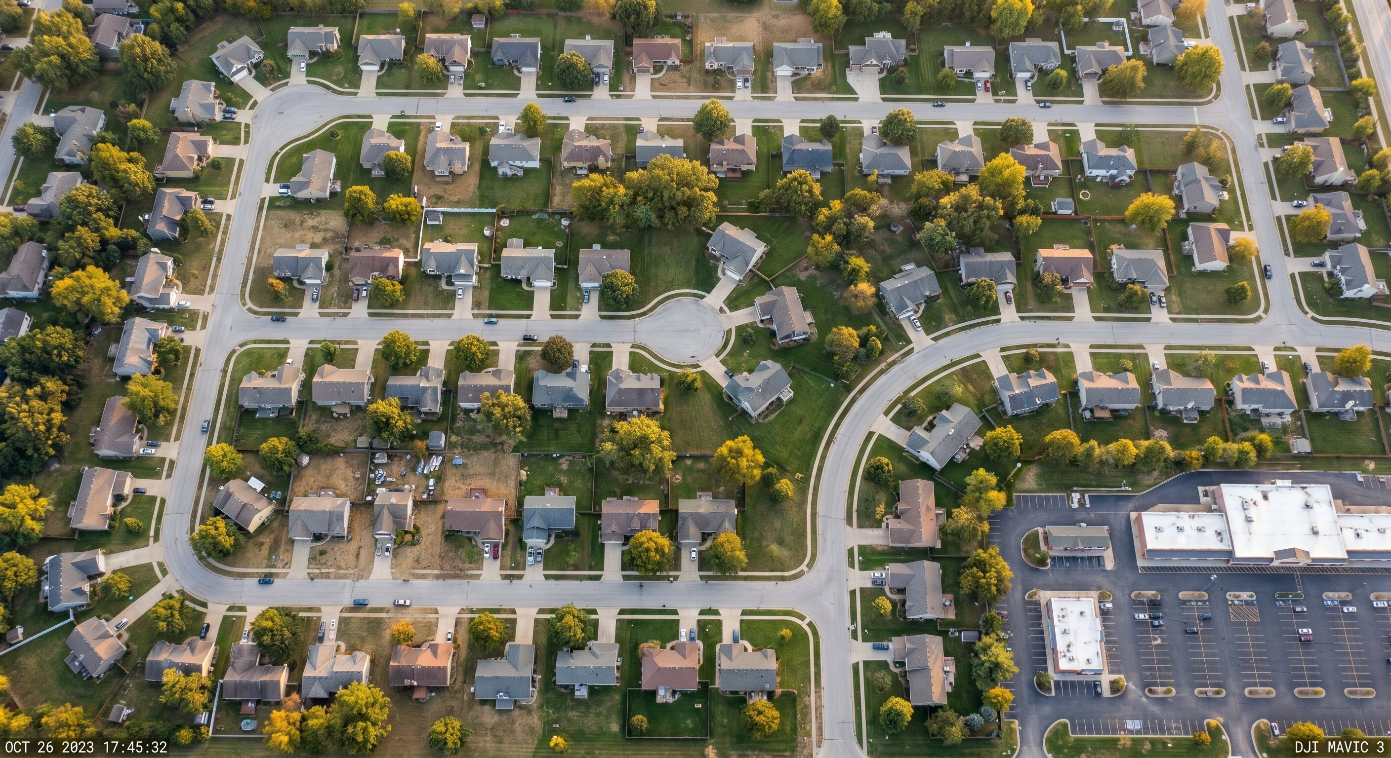 Aerial view of Johnson County Kansas suburban neighborhood in Kansas City metro at golden hour