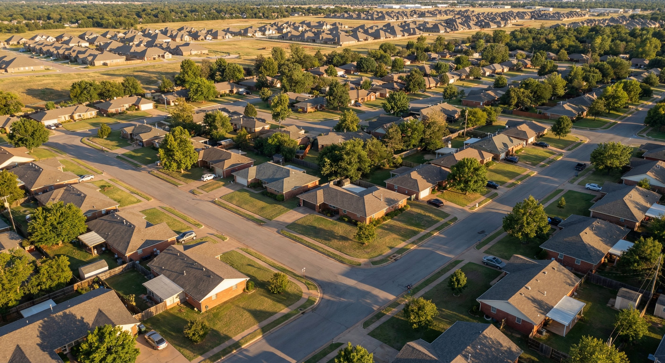 Aerial view of an Oklahoma City neighborhood with diverse housing styles, showing the density and character of the market