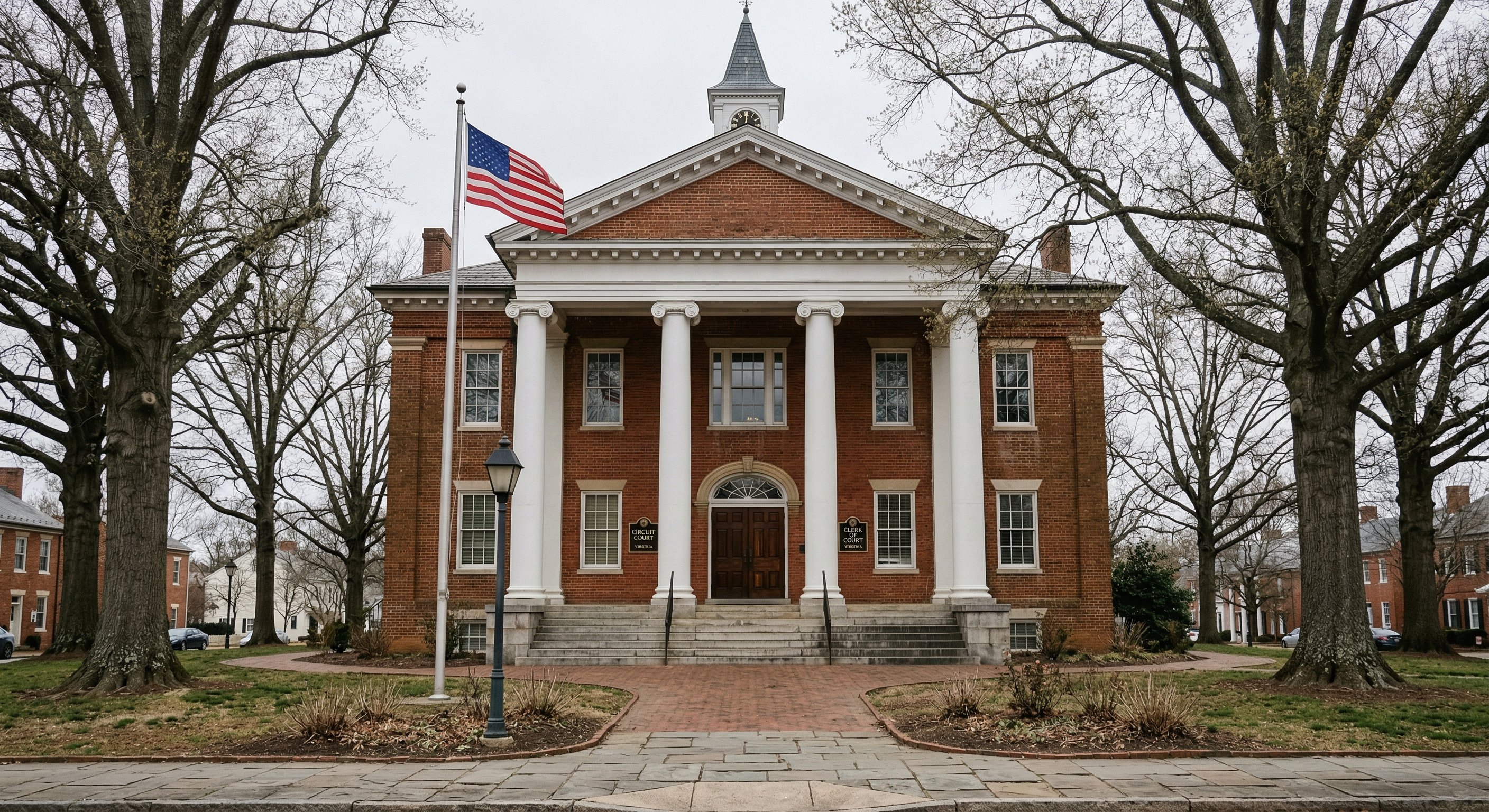 Exterior of a Virginia Circuit Court building with classical columns and public entrance signage