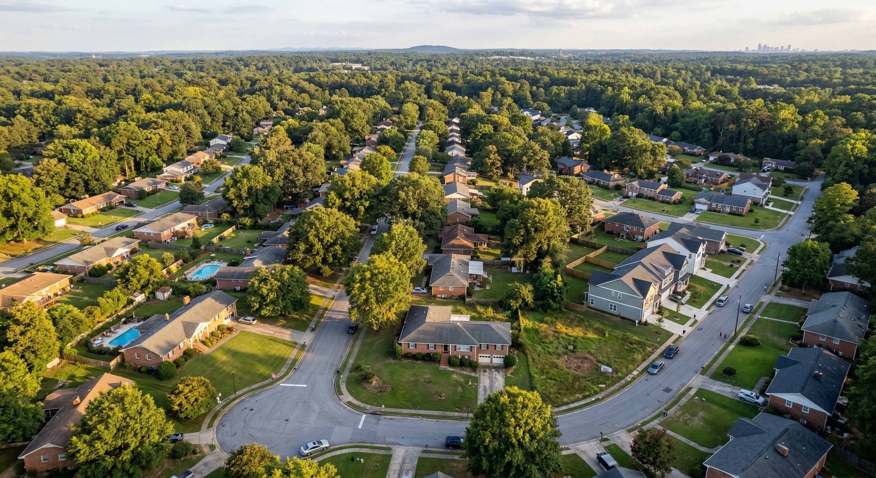 Aerial view of suburban Atlanta neighborhood with single-family homes showing typical investor target market